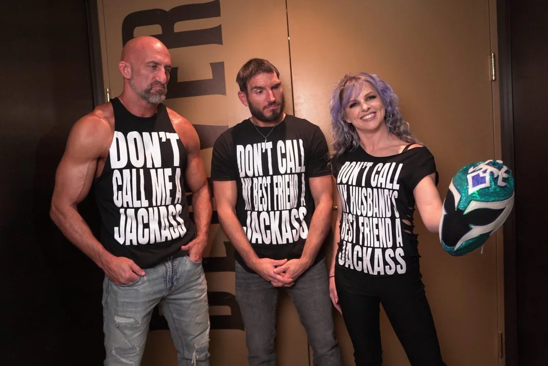 DIY and Candice LeRae pose with their new shirts